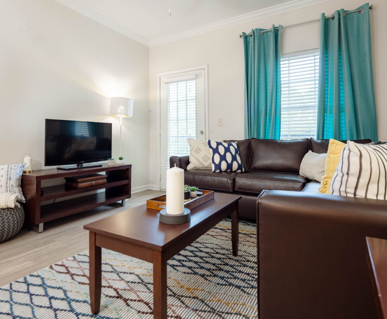 living room with leather couches